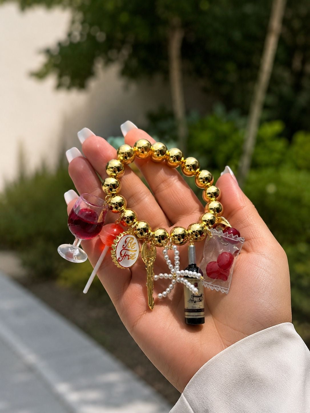 Be Free Gold Charm Bracelet
