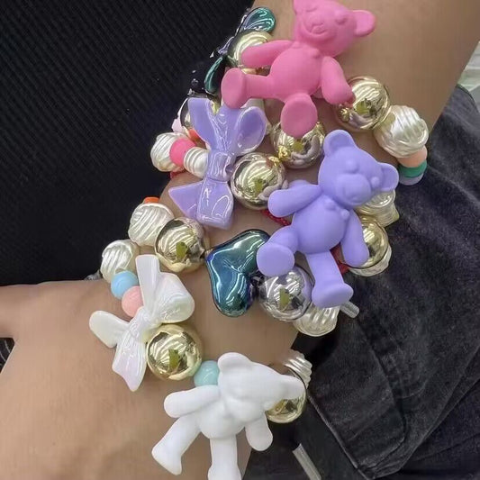 Pink Teddy Bear Bracelet with Iridescent Bow