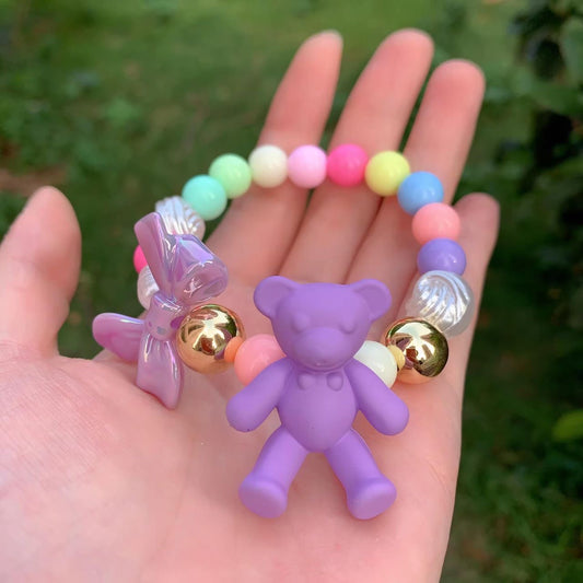 Purple Teddy Bear Bracelet with Iridescent Bow